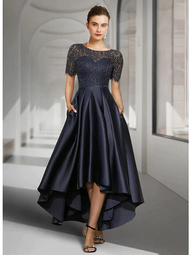 Elegant A-Line Mother of the Bride dress with jewel neck, short sleeves, asymmetrical lace, and pleats.
