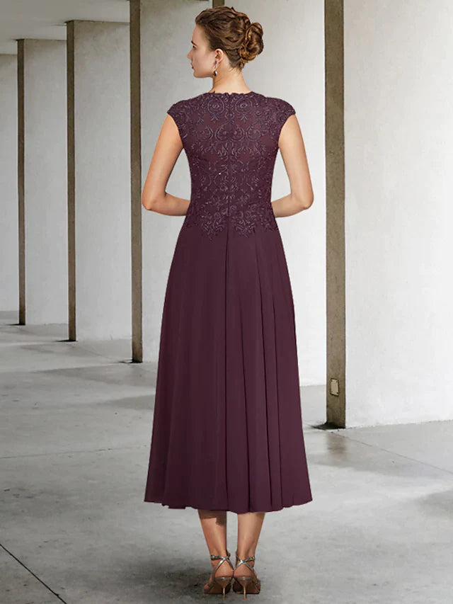 Close-up of the chiffon lace, pleats, and appliques on the A-Line formal gown.