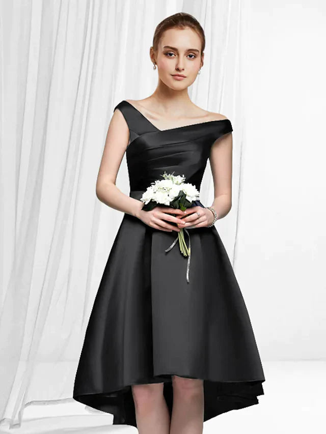 Woman wearing an elegant A-line off-shoulder satin cocktail dress with an asymmetrical hem.