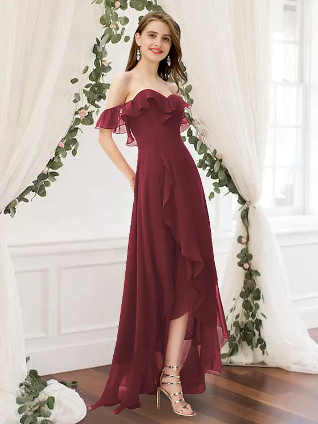 Elegant A-Line off-shoulder chiffon bridesmaid dress in dark blue with pleats and a split front.