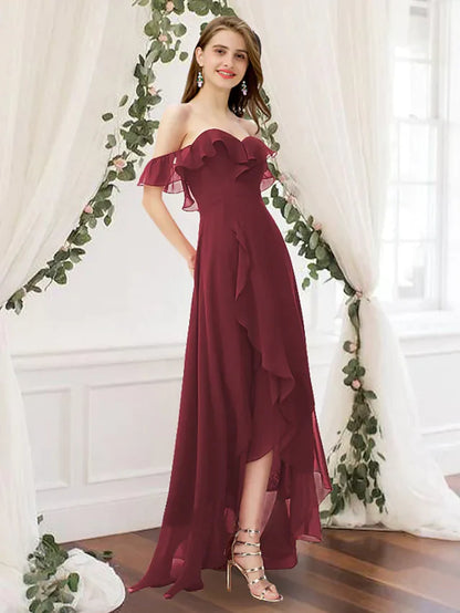 Elegant A-Line off-shoulder chiffon bridesmaid dress in dark blue with pleats and a split front.