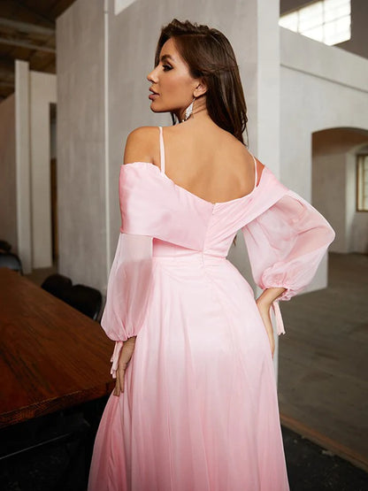 Graceful A-Line prom dress with off-the-shoulder neckline and long sleeves, side view.