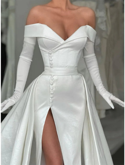 Back view of the A-line satin evening gown, featuring button details and a court train.