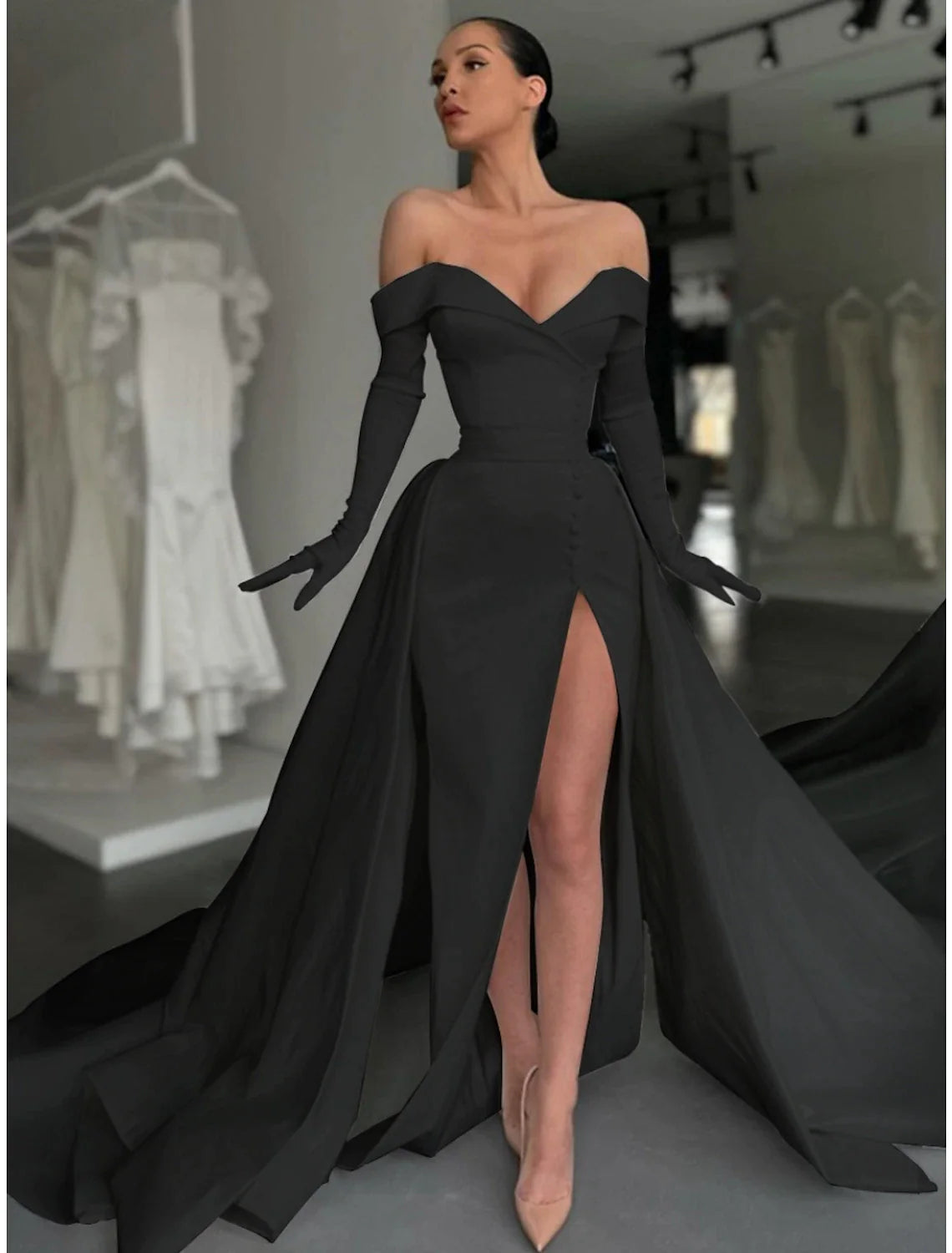 Front view of the elegant satin gown, highlighting the A-line silhouette, pleats, and thigh-high slit.