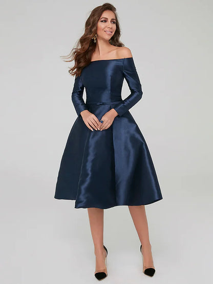 Close-up of the off-shoulder neckline and long sleeve detail on the luxurious satin dress.