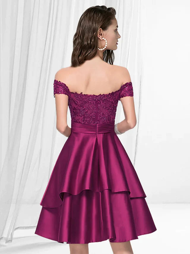 Back view of the A-line off-shoulder satin knee-length dress with delicate pleats.