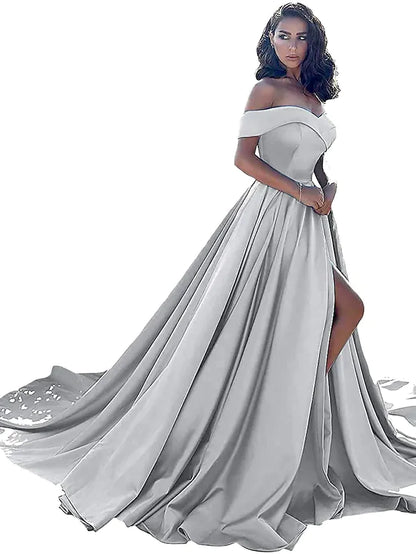 Model walking in a red A-line off-shoulder satin dress, showcasing its movement.