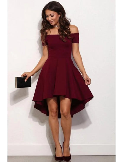 Woman wearing an A-line off-shoulder short sleeve satin mini dress.