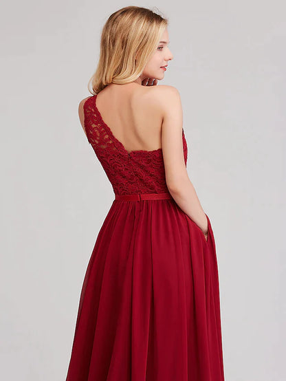 Full length view of the A-line one-shoulder bridesmaid dress with a sash.