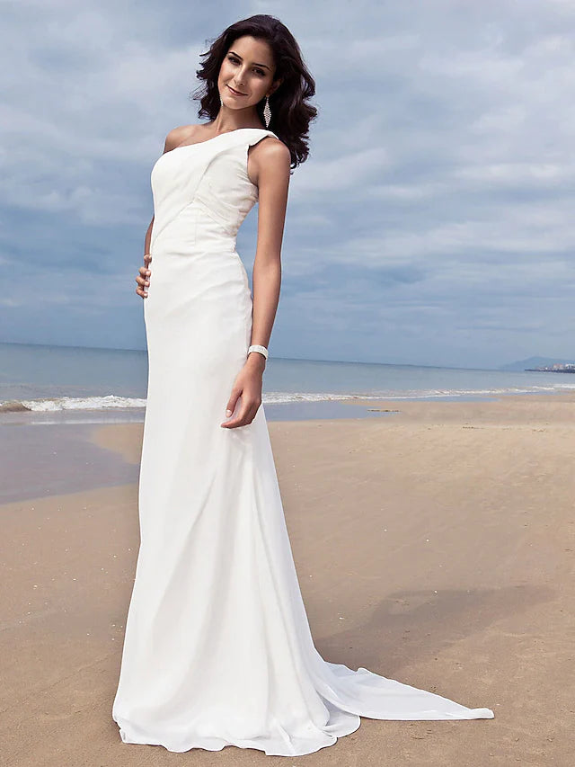 Full length view of a bride in the side-draped one-shoulder wedding dress.