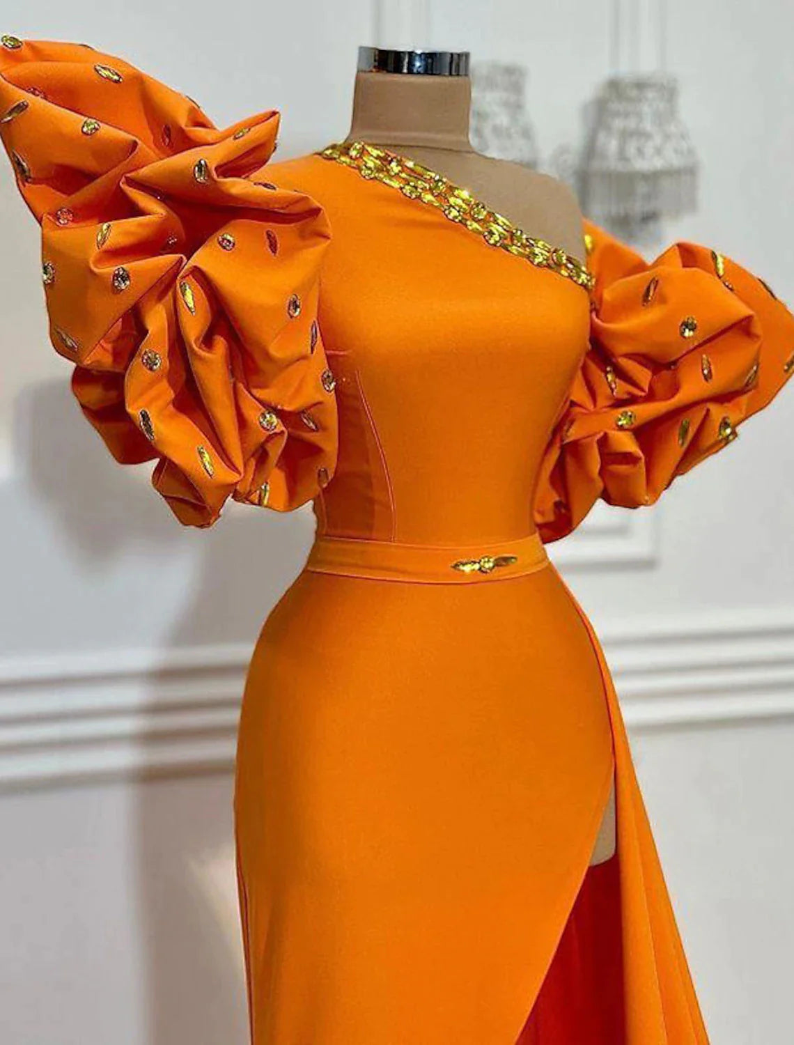 Back view of the A-line one-shoulder floral satin evening gown, showcasing the flowing court train.