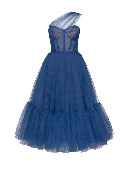 Model wearing an elegant A-line one-shoulder tulle dress with delicate pleats.