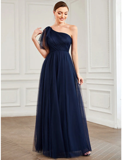 Back view of the light blue A-line one-shoulder tulle gown, highlighting the floor-length design.
