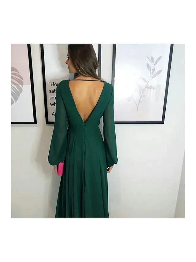 A-line chiffon bridesmaid dress with plunging neck and pleats, side view.