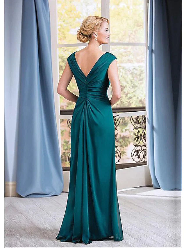 Back view of a floor-length chiffon gown with a flowing skirt, suitable for formal events.