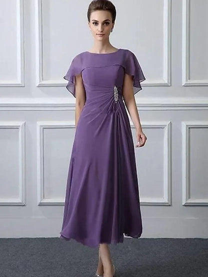 Back view of the A-line plus size mother of the bride dress featuring ruffles and ruching.
