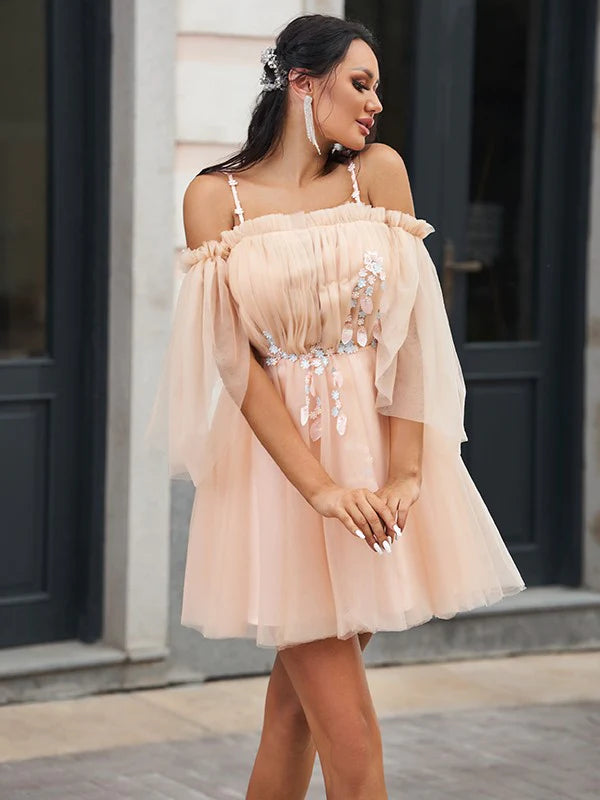 Side view of the A-line princess short mini dress, showcasing tulle and beaded details.