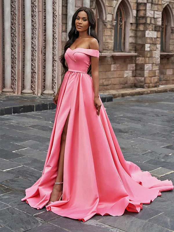 Close-up of off-the-shoulder ruffled bodice on a satin prom dress.