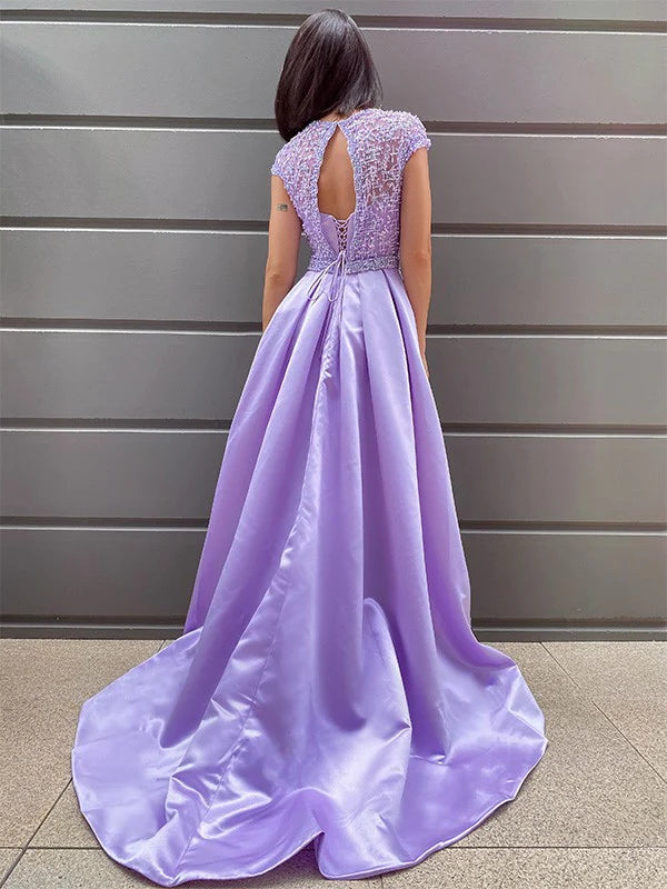 Elegant A-Line satin prom dress, side view, showcasing beading details.