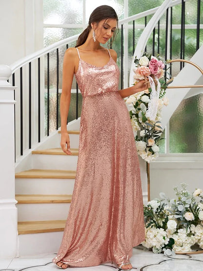 Elegant A-line princess bridesmaid dress with sequins and ruched straps.
