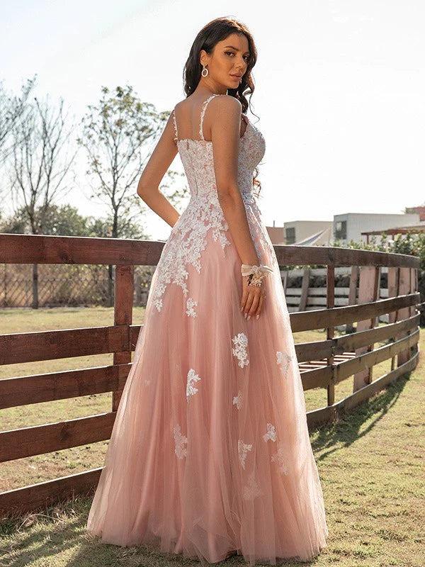 Sleeveless A-Line Tulle Prom Gown with intricate appliques, side view.