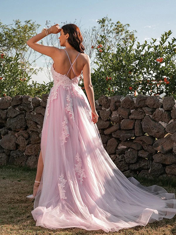 Side view of the pink A-line prom dress, highlighting the flowing tulle skirt.