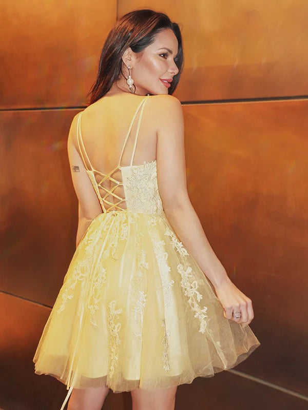 Back view of the short mini A-line tulle dress, showcasing the skirt.