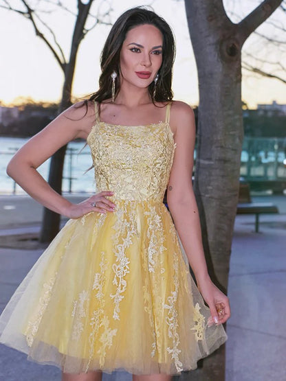 Side view of the elegant A-line dress, highlighting the applique bodice and silhouette.