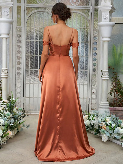 Close-up of ruched sweetheart neckline on a silk-like satin bridesmaid dress.