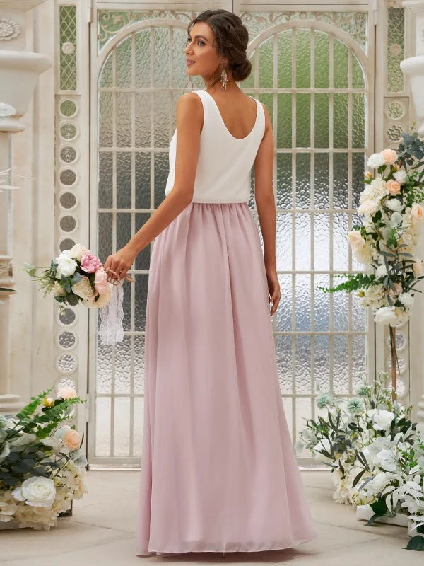 Close-up of the scoop neck and chiffon ruffles on the bridesmaid dress.
