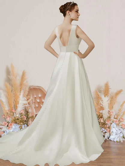 Back view of the A-Line satin wedding dress, highlighting the court train and pleats.