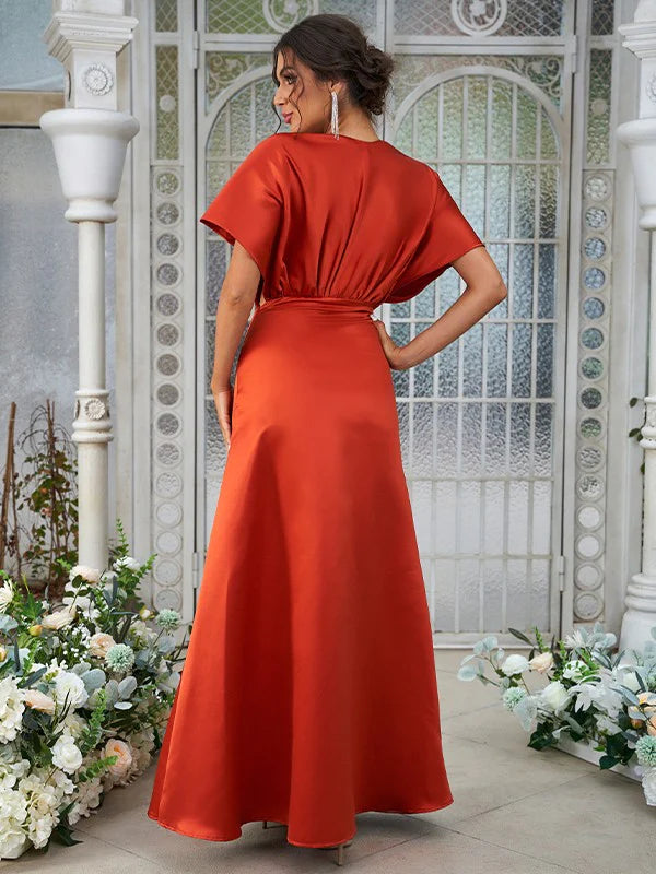 Back view of an A-Line satin ruched V-neck short sleeve floor-length bridesmaid dress.
