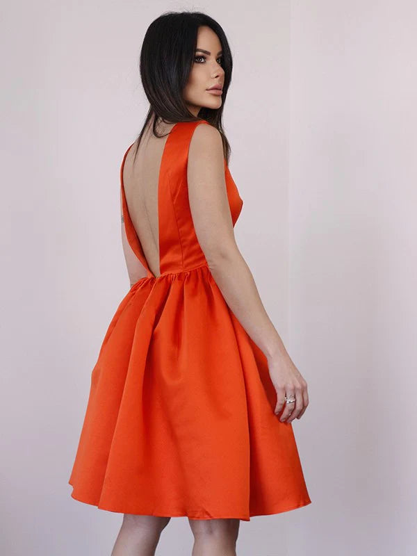 A-Line satin mini dress with ruffles and scoop neck, side view.
