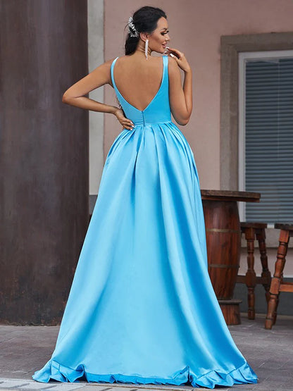 A-Line satin prom dress with asymmetrical hem and ruffle details.