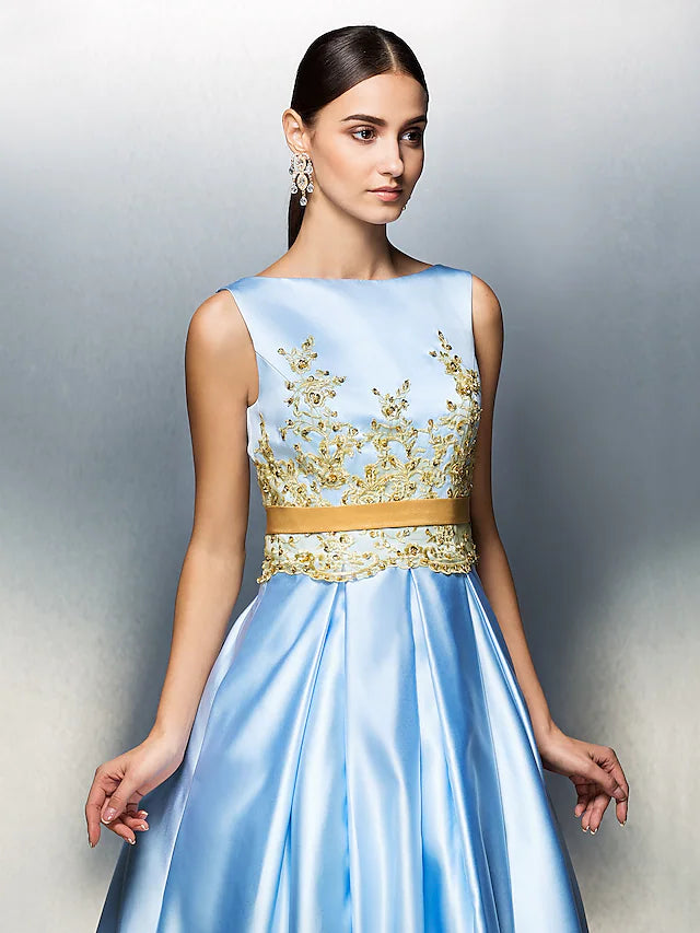 Side view of woman wearing A-line satin tea length dress.
