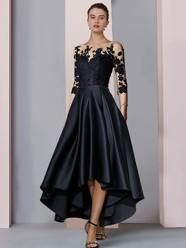 Model wearing an elegant A-line high-low tea length dress with 3/4 lace sleeves and appliques.