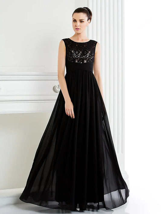 Woman wearing an elegant A-line scoop neck chiffon lace floor length Mother of the Bride dress.