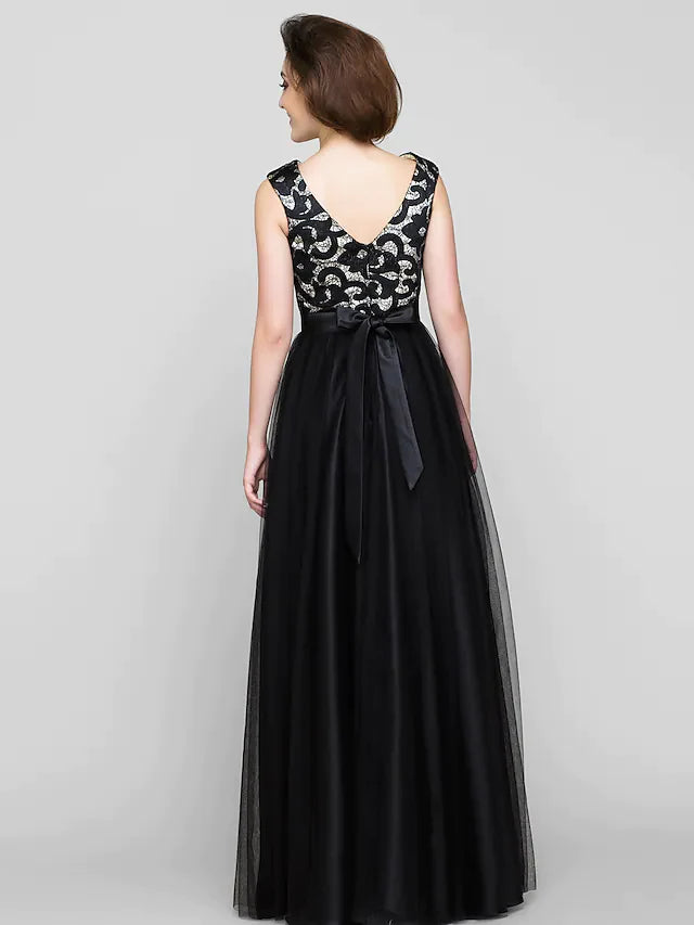 Side view of a woman in a patterned A-line mother of the bride dress.