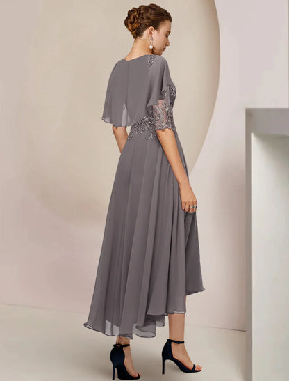 Formal tea-length chiffon lace dress with beading appliques, side view.
