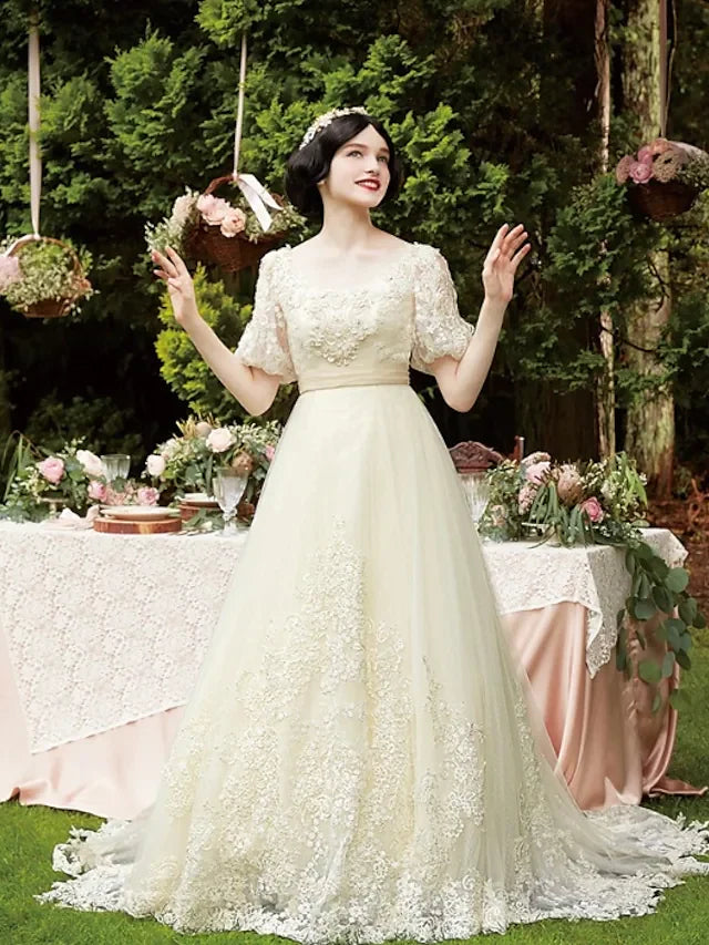 Elegant A-Line wedding dress with scoop neck and half sleeves, front view.