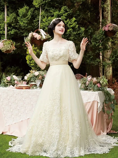 Elegant A-Line wedding dress with scoop neck and half sleeves, front view.