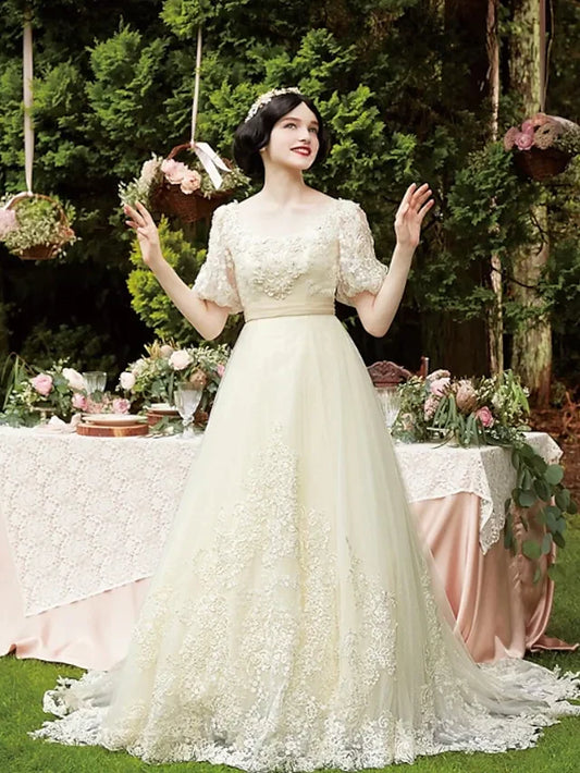 Elegant A-Line wedding dress with scoop neck and half sleeves, front view.