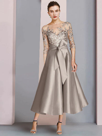 Elegant A-Line Mother of the Bride dress with scoop neck and half sleeves, front view.
