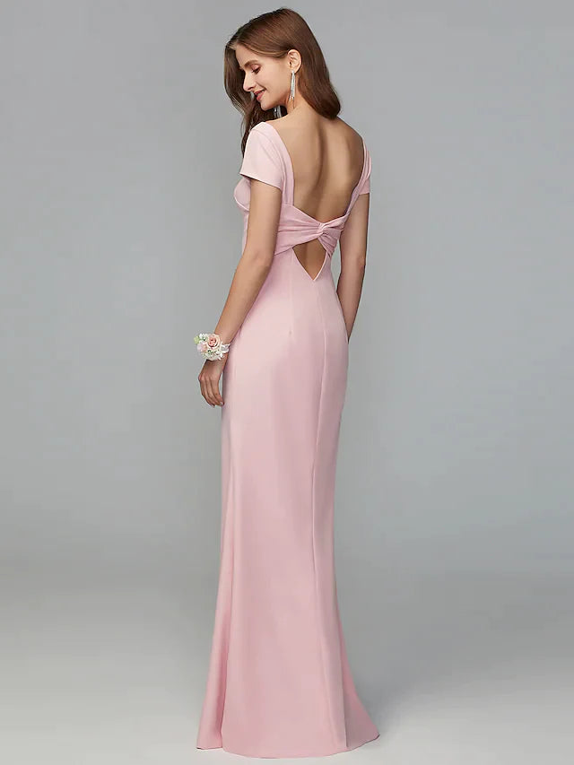 Close-up of the criss-cross draping open back on the floor-length jersey bridesmaid dress.