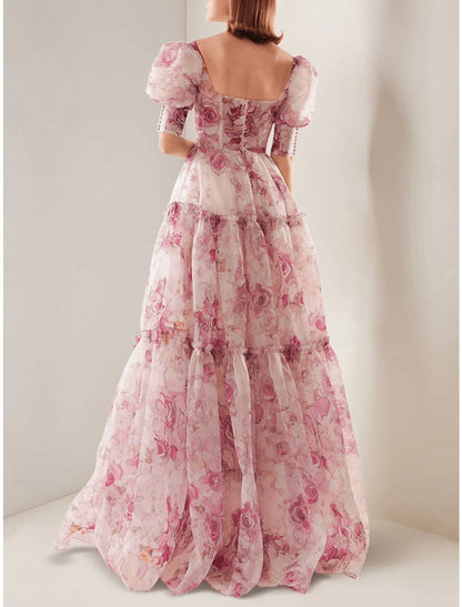 Royal style floor-length dress featuring a corset bodice and vibrant floral pattern.
