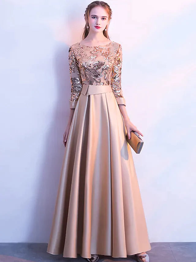 Woman posing in an elegant A-line sequin prom dress with jewel neck and 3/4 sleeves.
