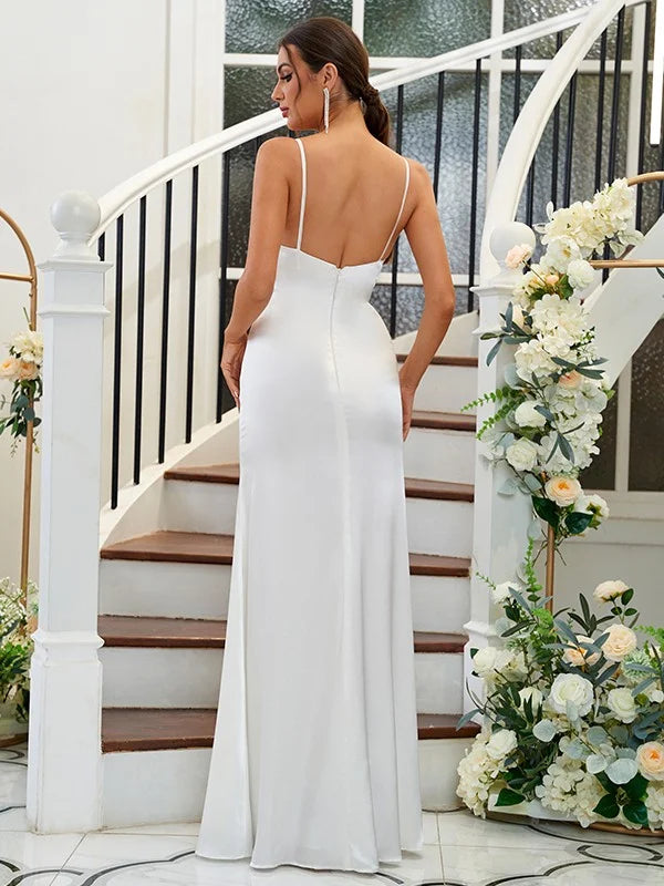 Back view of a floor-length silk-like satin bridesmaid dress with delicate ruffles.
