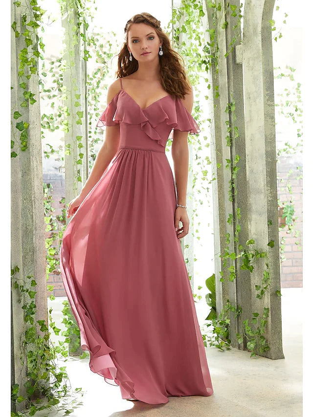 Elegant A-line spaghetti strap chiffon bridesmaid dress with ruffles and ruching.