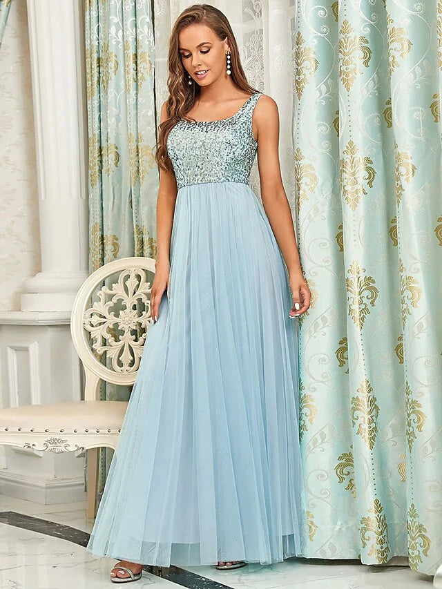 Close-up of the shimmering sequin and soft tulle fabric on the elegant bridesmaid dress.