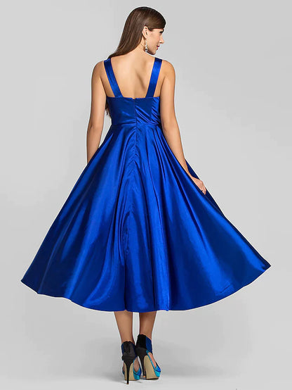 Back view of the A-line dress featuring a criss-cross detail.